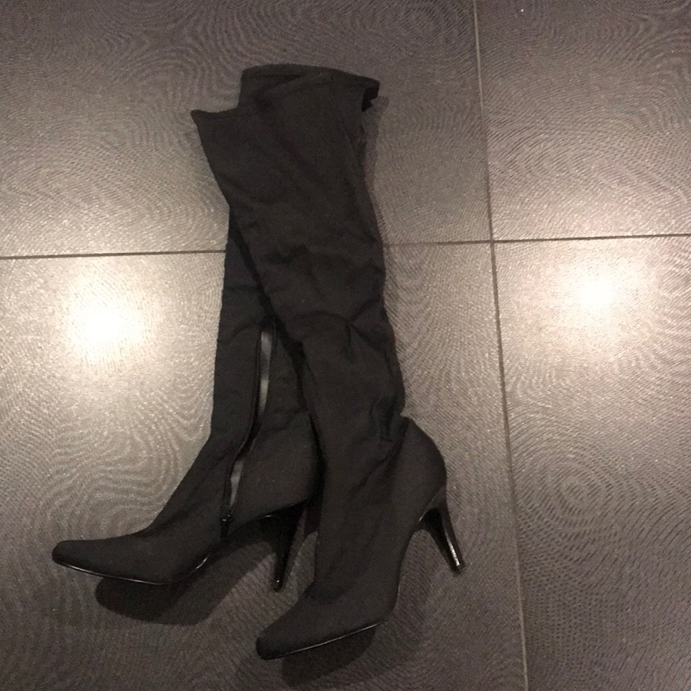 Knee high boots the material on top is stretch